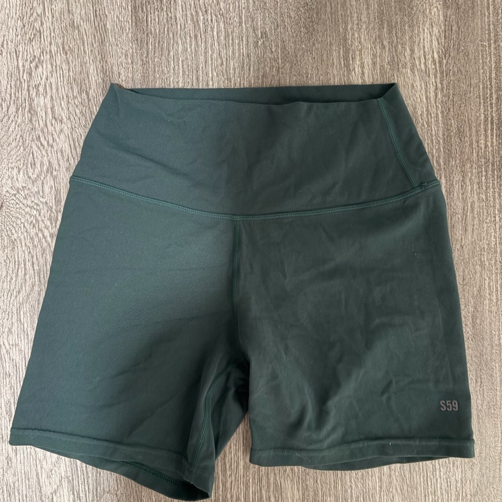 Splits59 Women's High-Waist Athletic Shorts in Dark Green